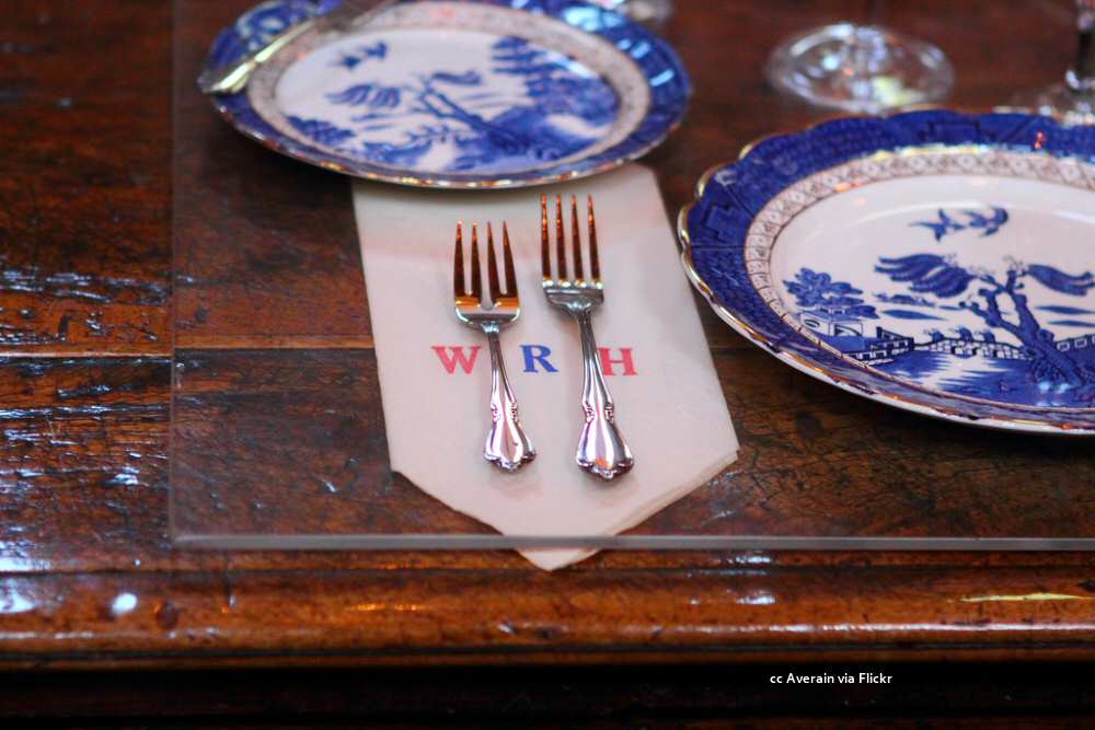 Dining room place setting with monogrammed paper napkin